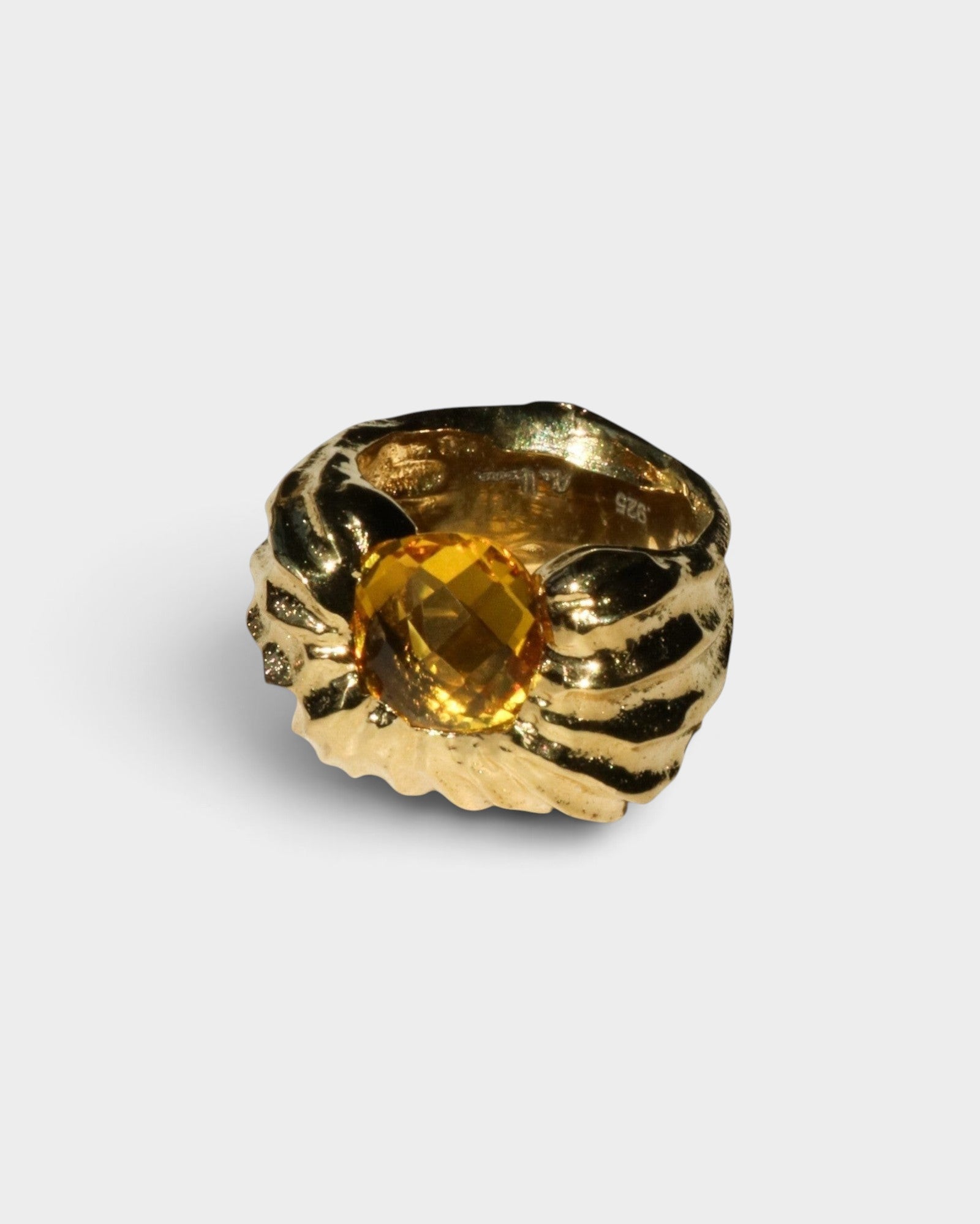 JONES + CO Theo chunky sculptural sterling silver ring featuring a faceted warm citrine stone.