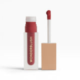JONES + CO La Laque Tinted Lip Oil in a sheer red shade, with a frosted bottle and gold lettering.