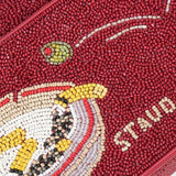 JONES + CO Tommy beaded shoulder bag in deep red with a playful martini glass graphic and vegan leather piping