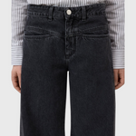 JONES + CO Tori X dark gray barrel fit jeans with mid-rise waist, iconic X-pockets, and offset side seams.