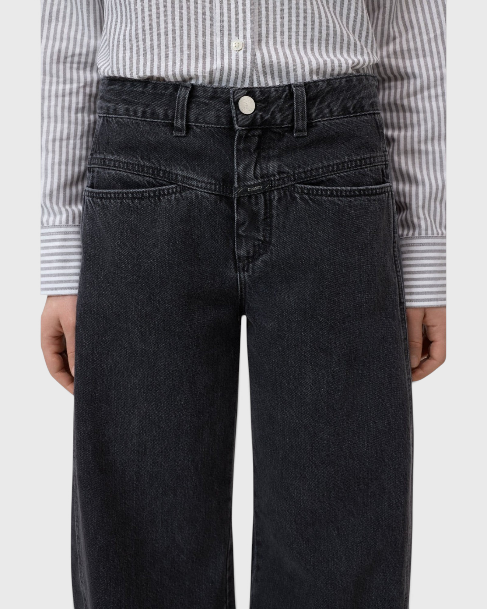 JONES + CO Tori X dark gray barrel fit jeans with mid-rise waist, iconic X-pockets, and offset side seams.