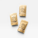 Three JONES + CO Umami Salt pouches featuring shiitake mushroom and sea salt blend in minimalist kraft paper packaging