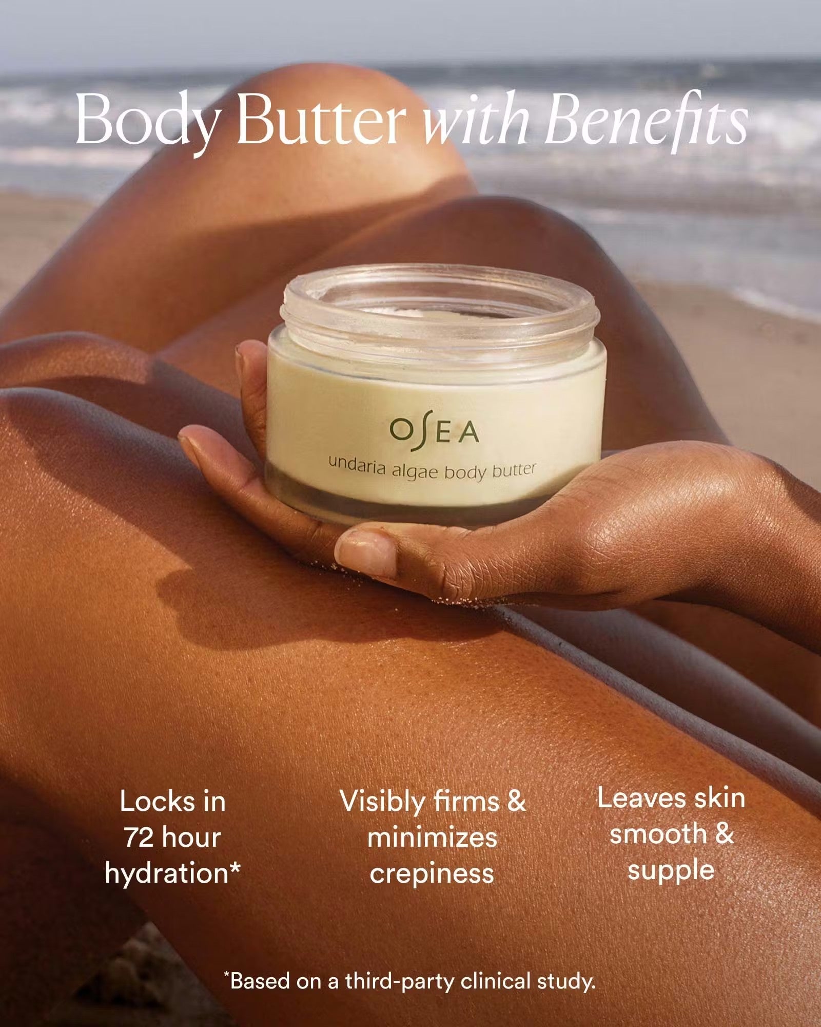 JONES + CO Undaria Algae Body Butter jar held by a person with tanned skin on a beach, promoting hydration and firming.