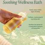 JONES + CO Vagus Nerve Bath Oil bottle being poured into a bubbly bath for stress relief and skin softening.