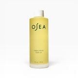 JONES + CO Vagus Nerve Bath Oil bottle, a pale yellow oil with white cap, promotes serenity and softens skin.