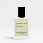 JONES + CO No.15 Vanille Infinie perfume oil in a clear glass bottle with a black cap and cream label.