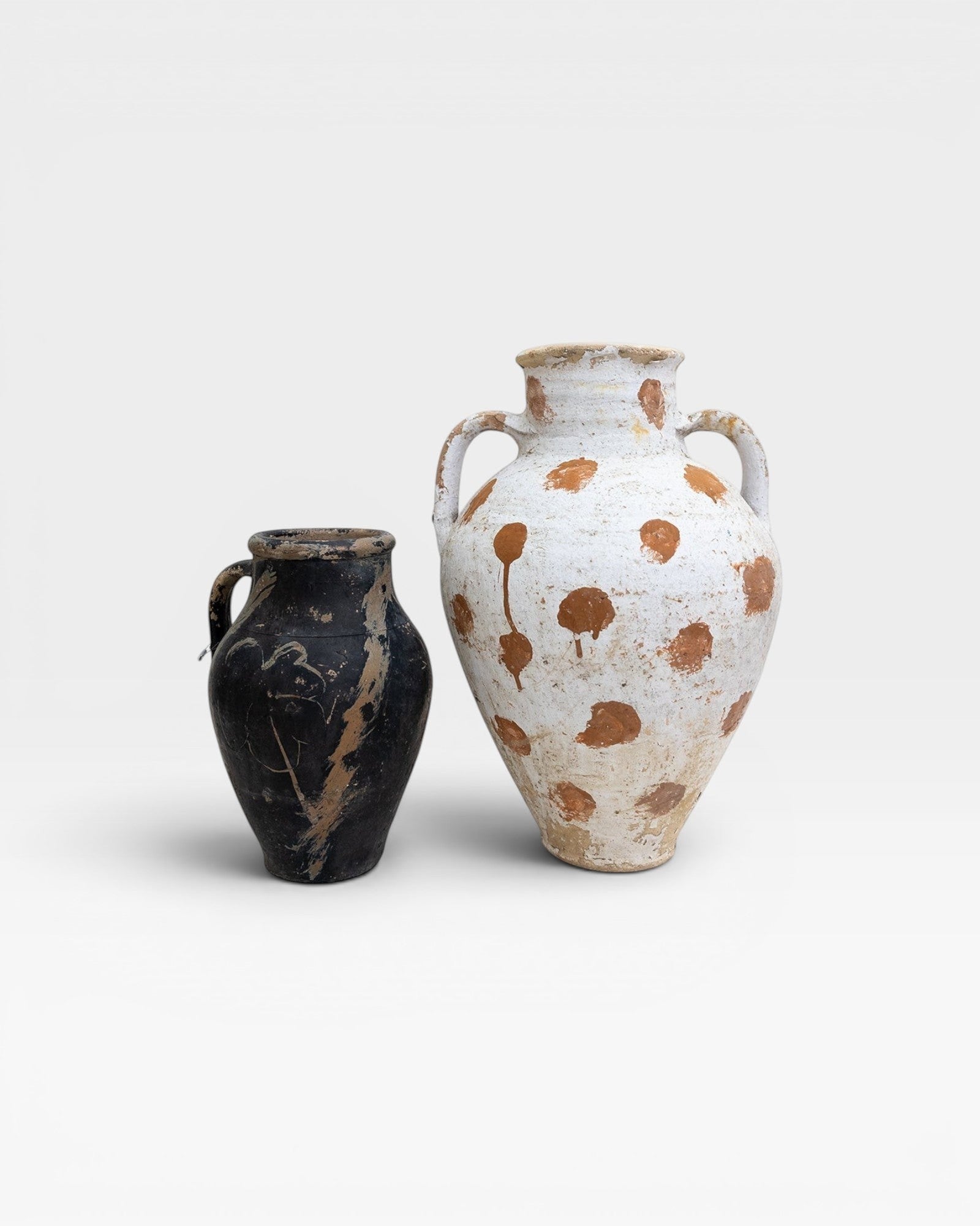 JONES + CO vintage Anatolian olive jar, white limewash with terracotta polka dots, hand-thrown in Turkey, aged patina.