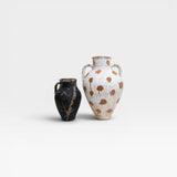 JONES + CO vintage Turkish pottery, one black with etched floral design, one white with brown polka dots. 10-12 inches.