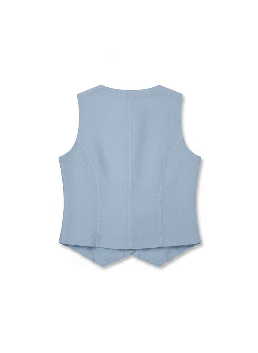 JONES + CO Violette Vest in baby blue heavyweight linen with Italian buttons. Sleeveless, tailored fit.