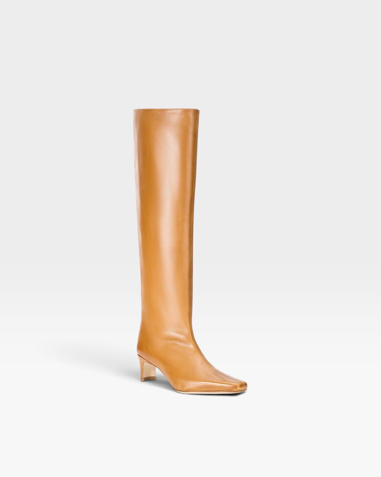 JONES + CO Wally knee-high boot in cashew distressed leather with a pointed toe and slim block heel.