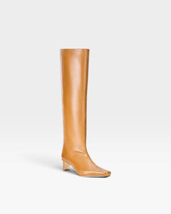 JONES + CO Wally knee-high boot in cashew distressed leather with a pointed toe and slim block heel.