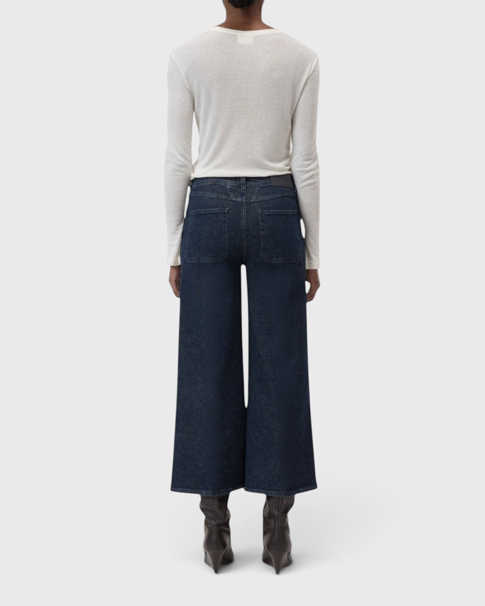 JONES + CO Wera dark blue stretch denim jeans with a high waist, wide cropped leg, and signature X-Pocket design.