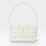 JONES + CO white beaded shoulder bag with 3D floral embellishments and vegan leather trim.