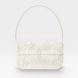JONES + CO white beaded shoulder bag with 3D floral embellishments and vegan leather trim.