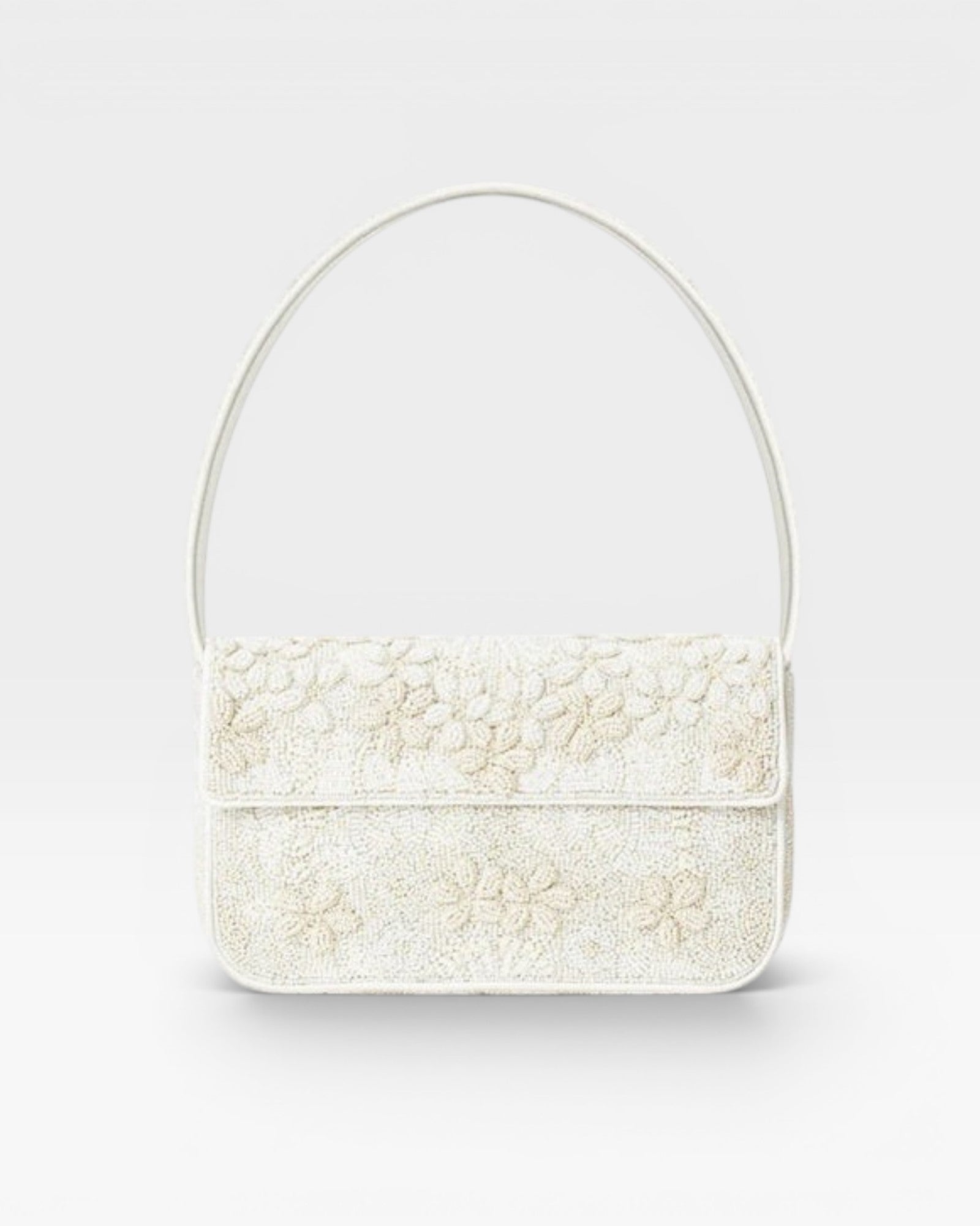JONES + CO white beaded shoulder bag with 3D floral embellishments and vegan leather trim.