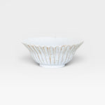 JONES + CO handmade white ceramic large bowl with speckled glaze and fluted design.