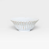 JONES + CO handmade white ceramic large bowl with speckled glaze and fluted design.