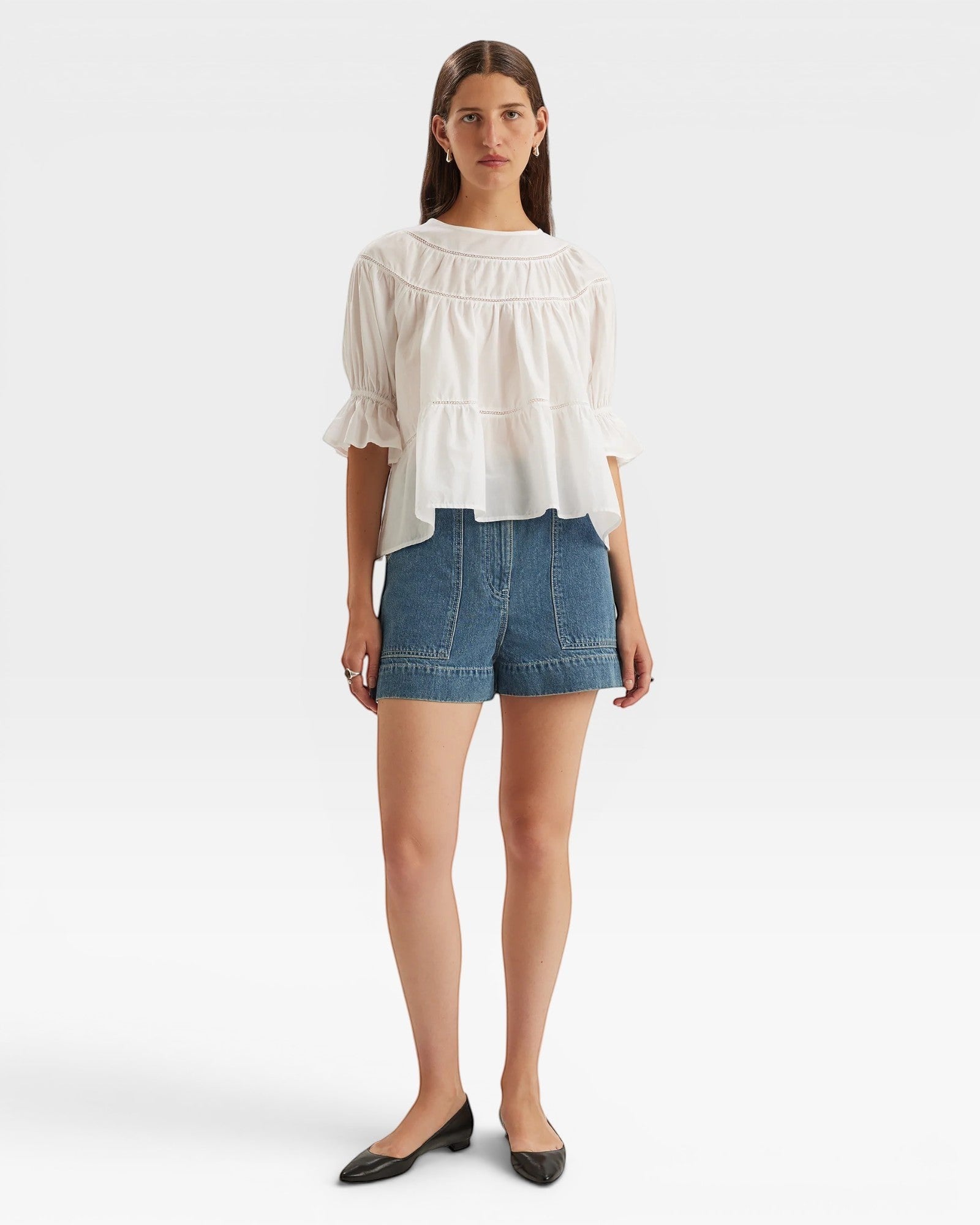 JONES + CO white 100% Pima cotton lawn blouse with boat neck, crochet trim, and puff sleeves.