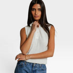 JONES + CO white pointelle knit sleeveless polo tank with ribbed hem and button detail.