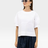 JONES + CO white 100% organic cotton rugby top with a boxy silhouette and subtle horizontal seam details.