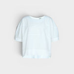 JONES + CO white organic cotton rugby top with a relaxed, boxy silhouette and subtle horizontal seam details.