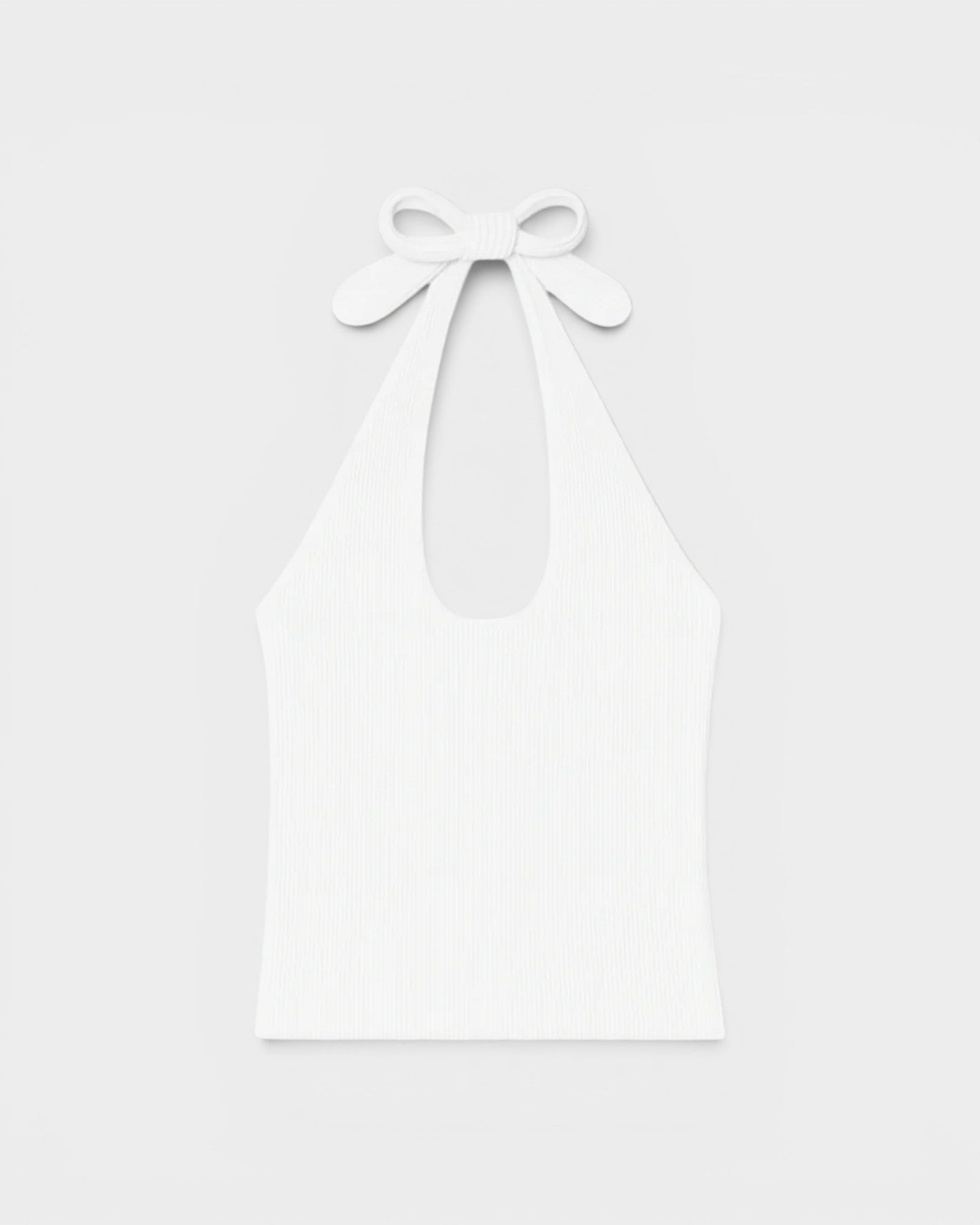 JONES + CO white ribbed halter top with a bow tie closure at the neck. Soft modal fabric.