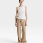 JONES + CO white supima cotton ribbed knit high-neck tank top with a fitted silhouette.