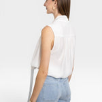 JONES + CO white sleeveless blouse with tie-neck detail, lightweight fabric, and a flattering silhouette.