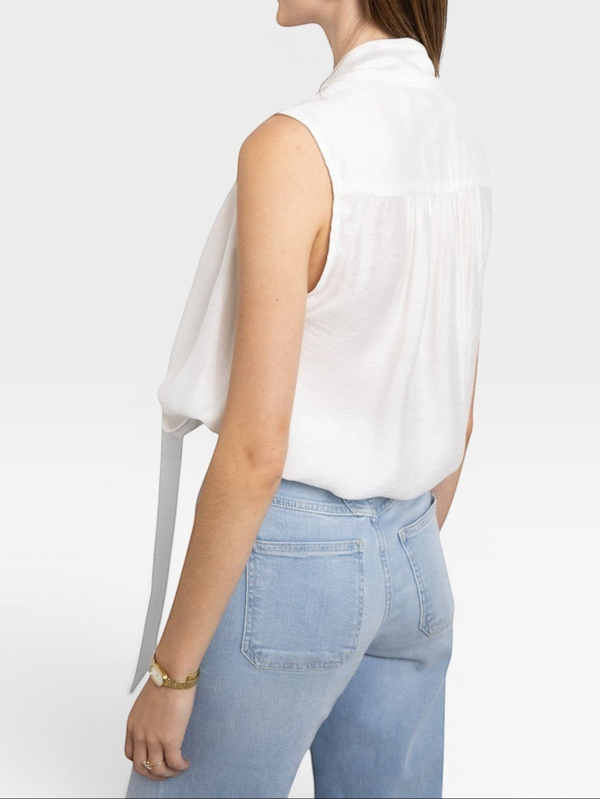 JONES + CO white sleeveless blouse with tie-neck detail, lightweight fabric, and a flattering silhouette.
