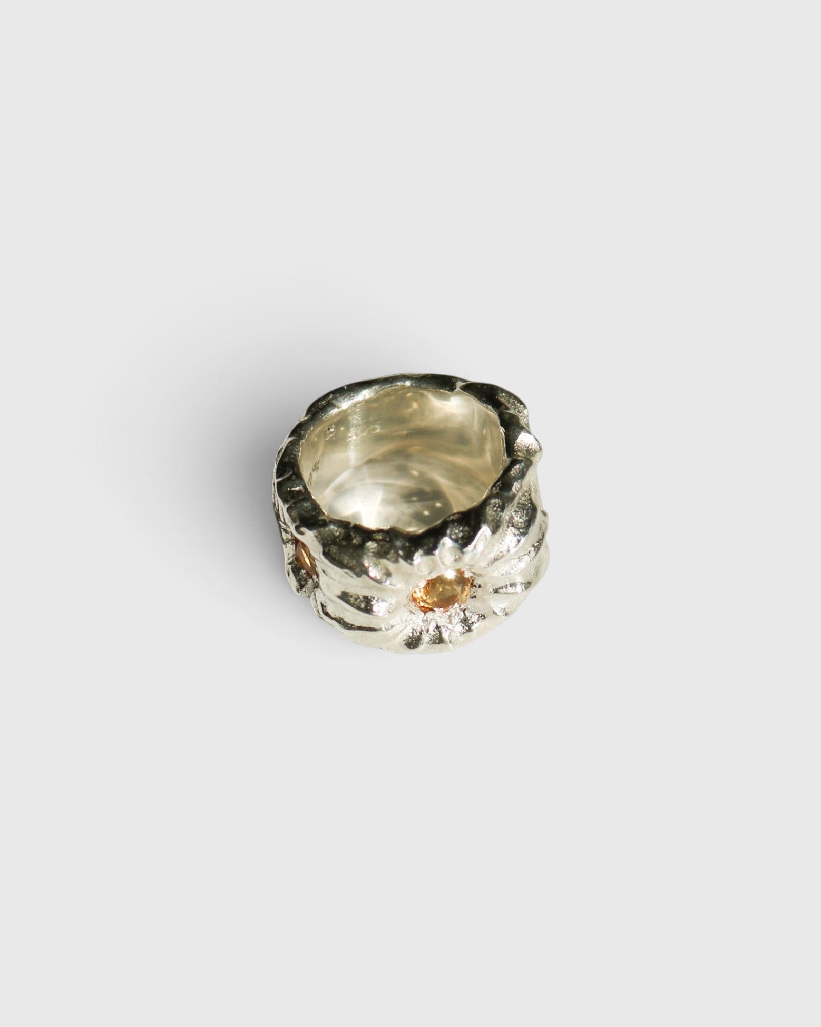 JONES + CO Willow chunky sterling silver ring with a textured sculptural finish and a central citrine gemstone.