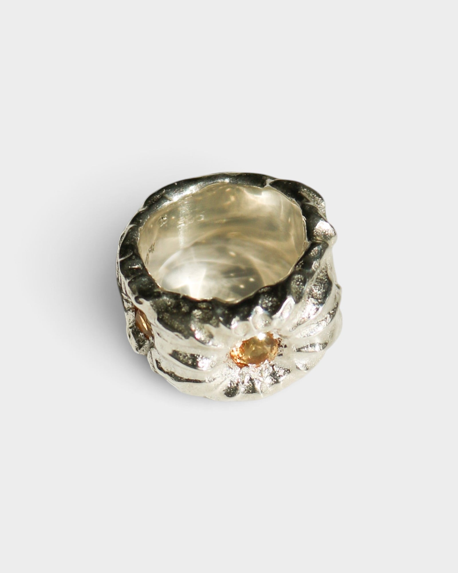 JONES + CO Willow ring in chunky sterling silver with a sculptural texture and a central citrine gemstone.