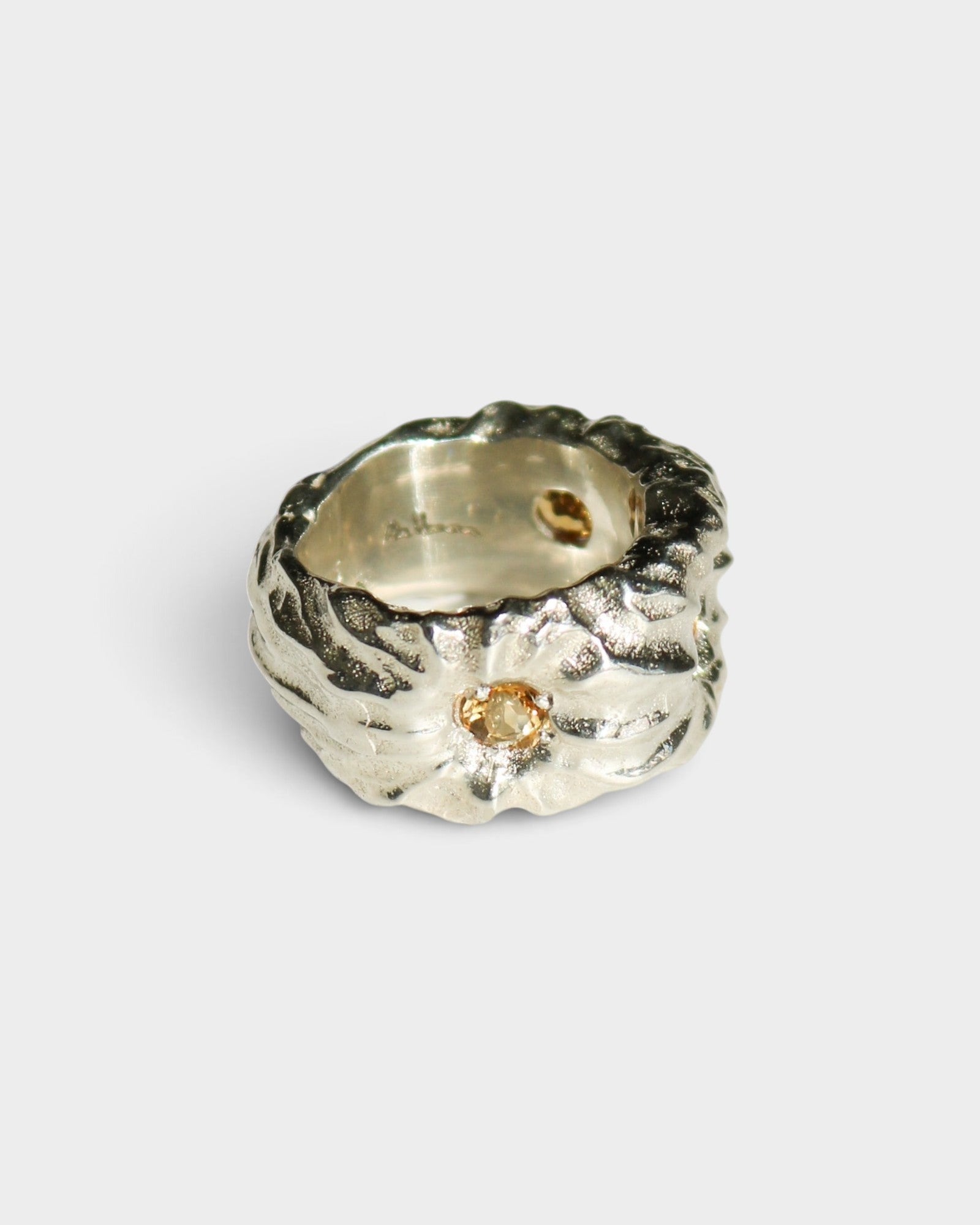 JONES + CO Willow sculptural sterling silver ring featuring a textured band and a central citrine gemstone.