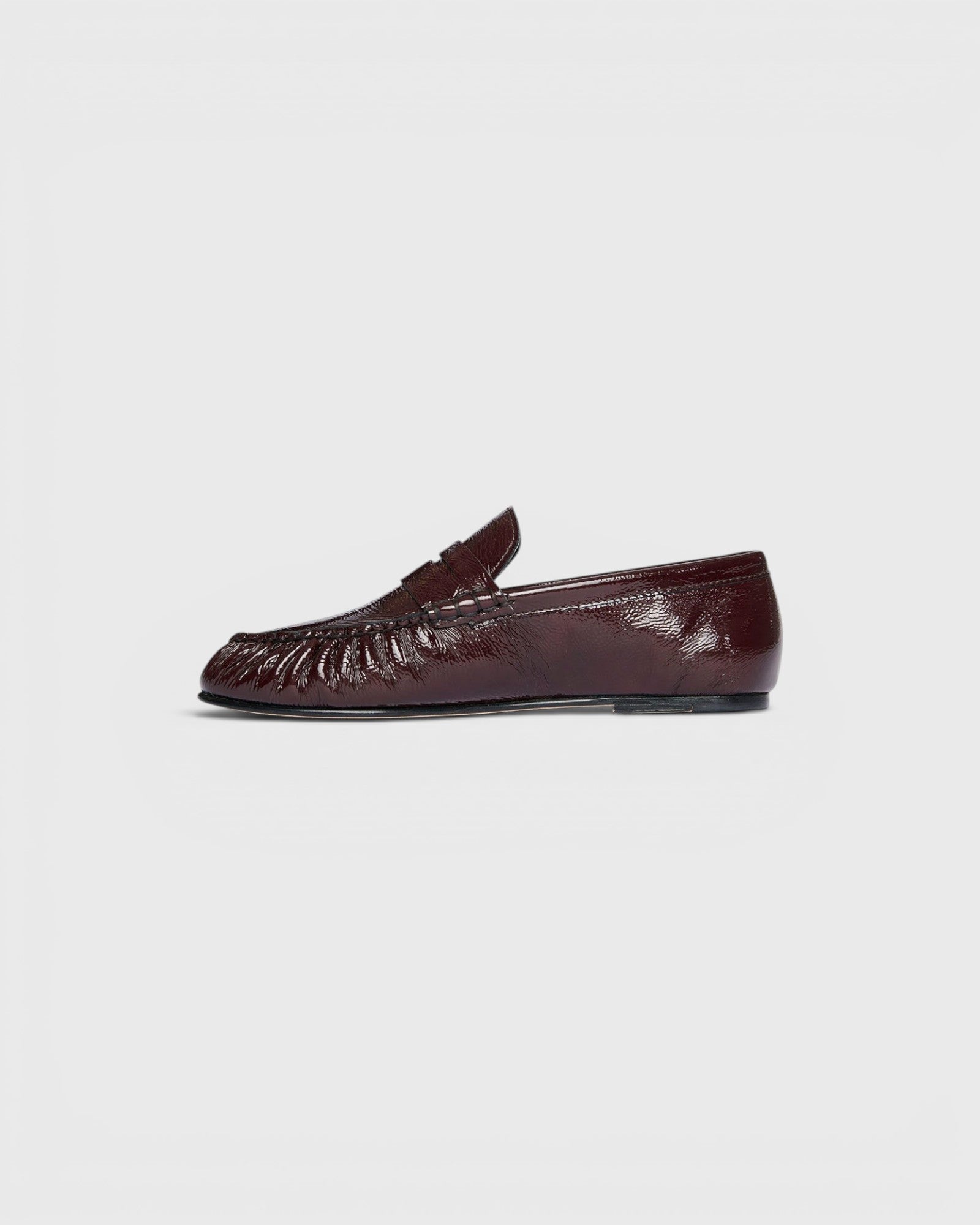 JONES + CO Sydney wine red crinkle patent leather penny loafer with ruched detailing on a flat sole