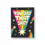 JONES + CO You Did That greeting card featuring retro rainbow typography and stars on a black background.