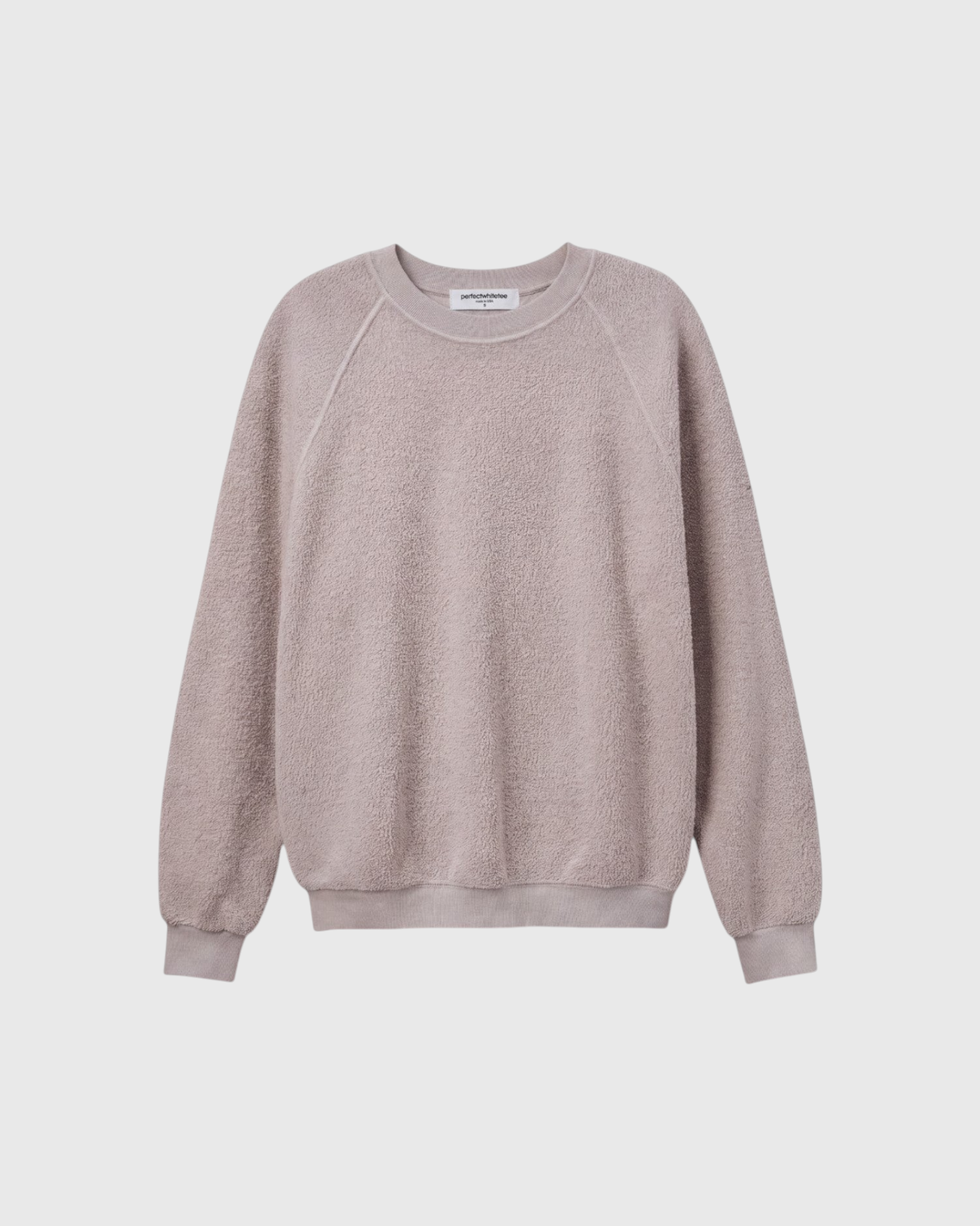 JONES + CO Ziggy sweatshirt in cloud gray featuring a soft textured fleece fabric and classic crew neck design.