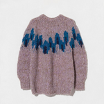 JONES + CO fleecy alpaca blend raglan pullover in light purple with a blue graphic intarsia pattern on the chest