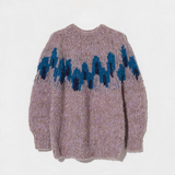 JONES + CO fleecy alpaca blend raglan pullover in light purple with a blue graphic intarsia pattern on the chest