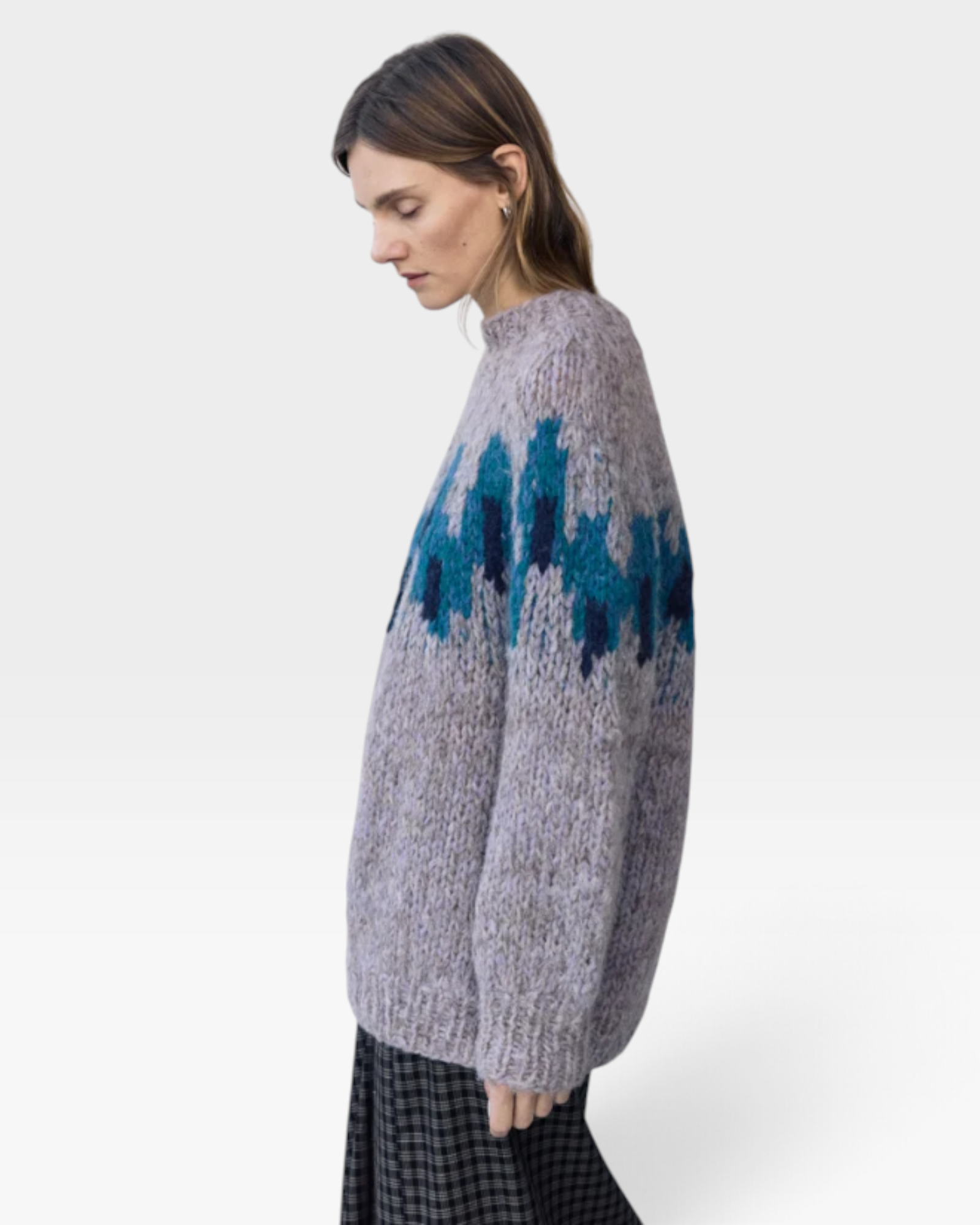 JONES + CO fleecy alpaca blend raglan pullover in grey with a blue intarsia graphic pattern worn by a model