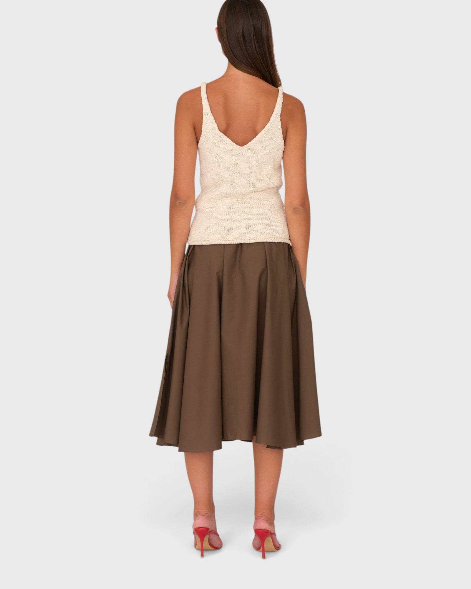 JONES + CO Angie skirt in chocolate brown cotton poplin, back view showing midi length and elastic waistband