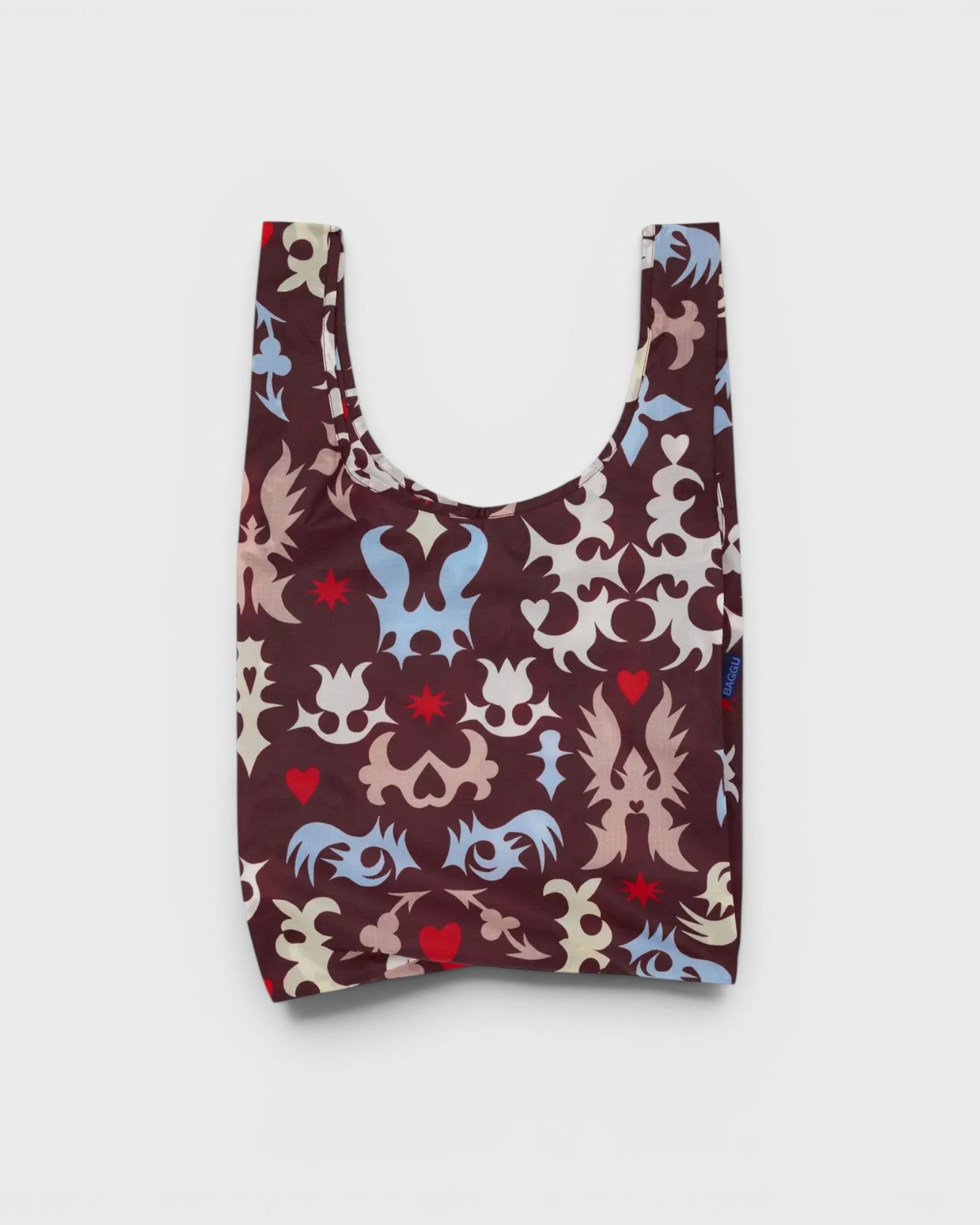 JONES + CO Baggu reusable grocery bag in brown nylon with a multi-coloured western cut-out pattern