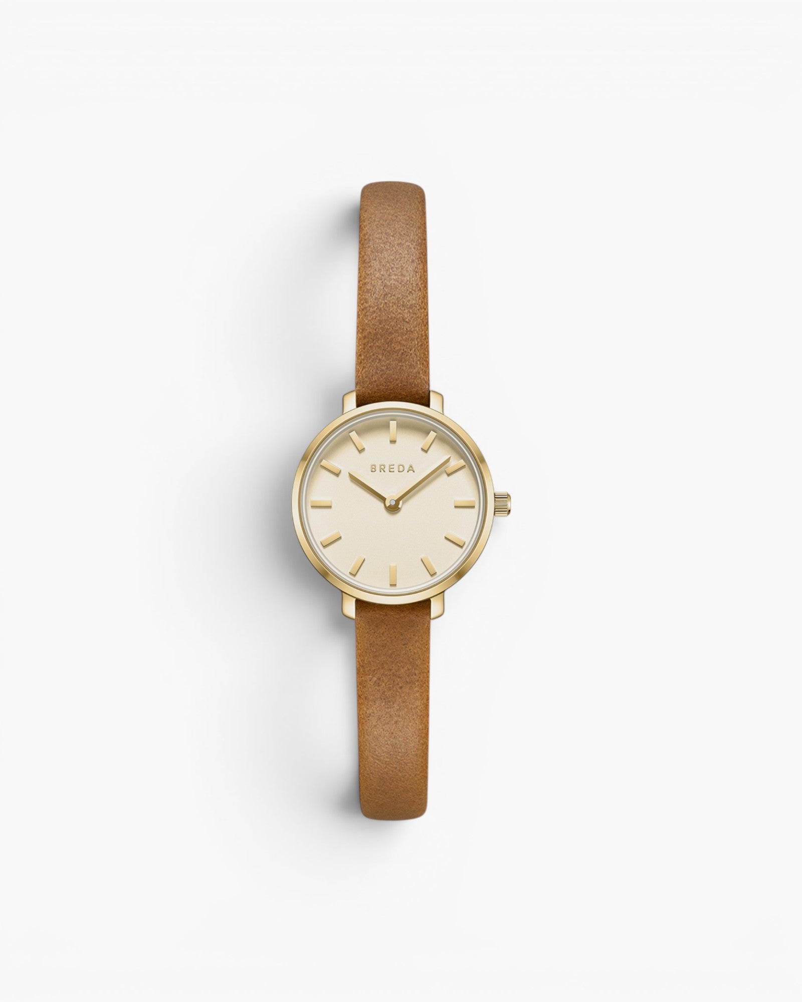 JONES + CO Beverly watch featuring a gold case, cream dial, and slim brown leather strap on a white background.