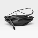 JONES + CO Bon-Bon M black soft calf leather crossbody bag with pleated ends and palladium-finished brass hardware.