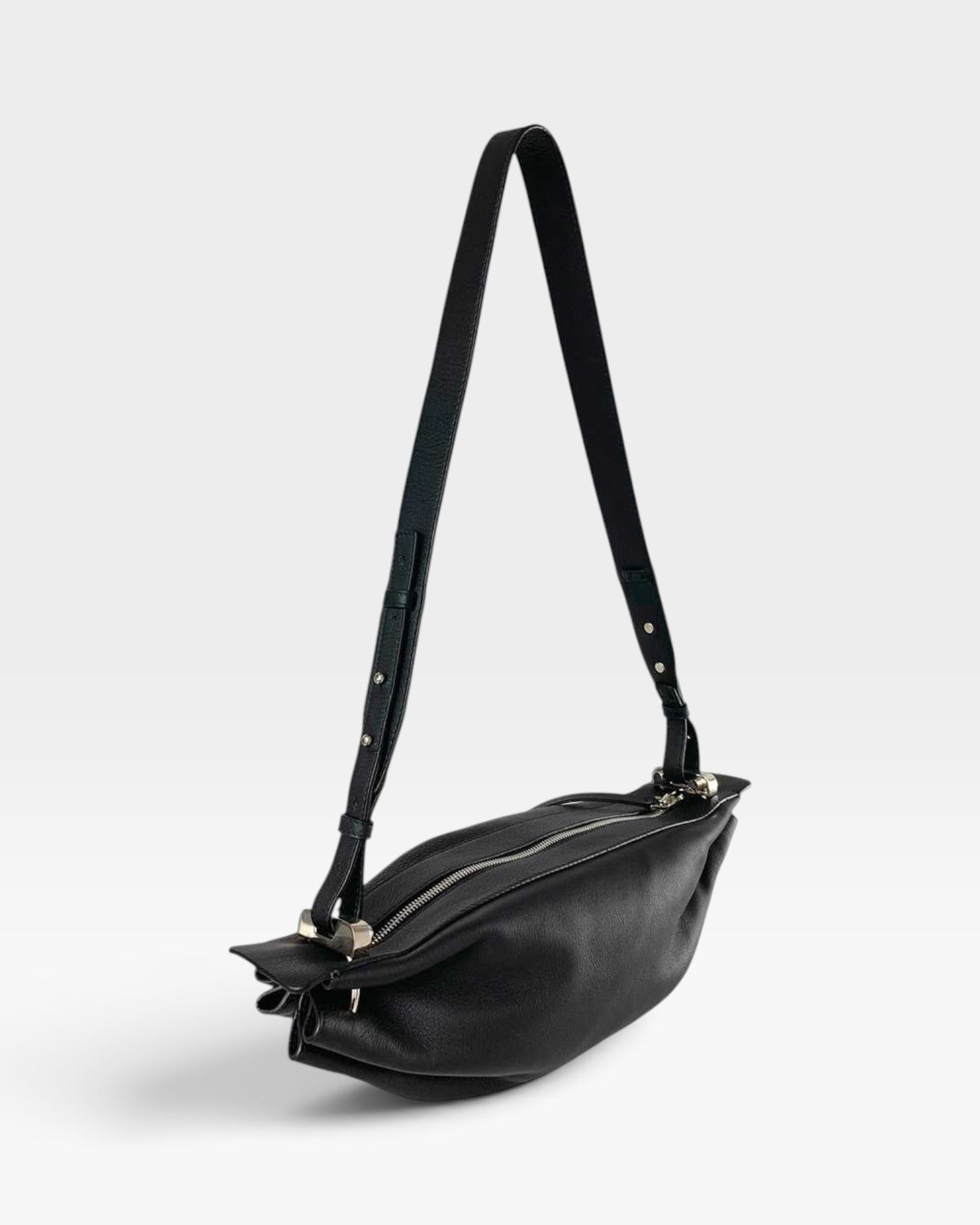 JONES + CO Bon-Bon M black soft calf leather crossbody bag with pleated ends and silver-tone metal hardware