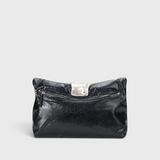 JONES + CO black snake-embossed leather slouchy clutch with a polished silver metal cuff and zip closure.
