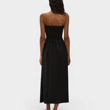 JONES + CO black strapless midi dress with a smocked bodice and relaxed skirt, back view on a model