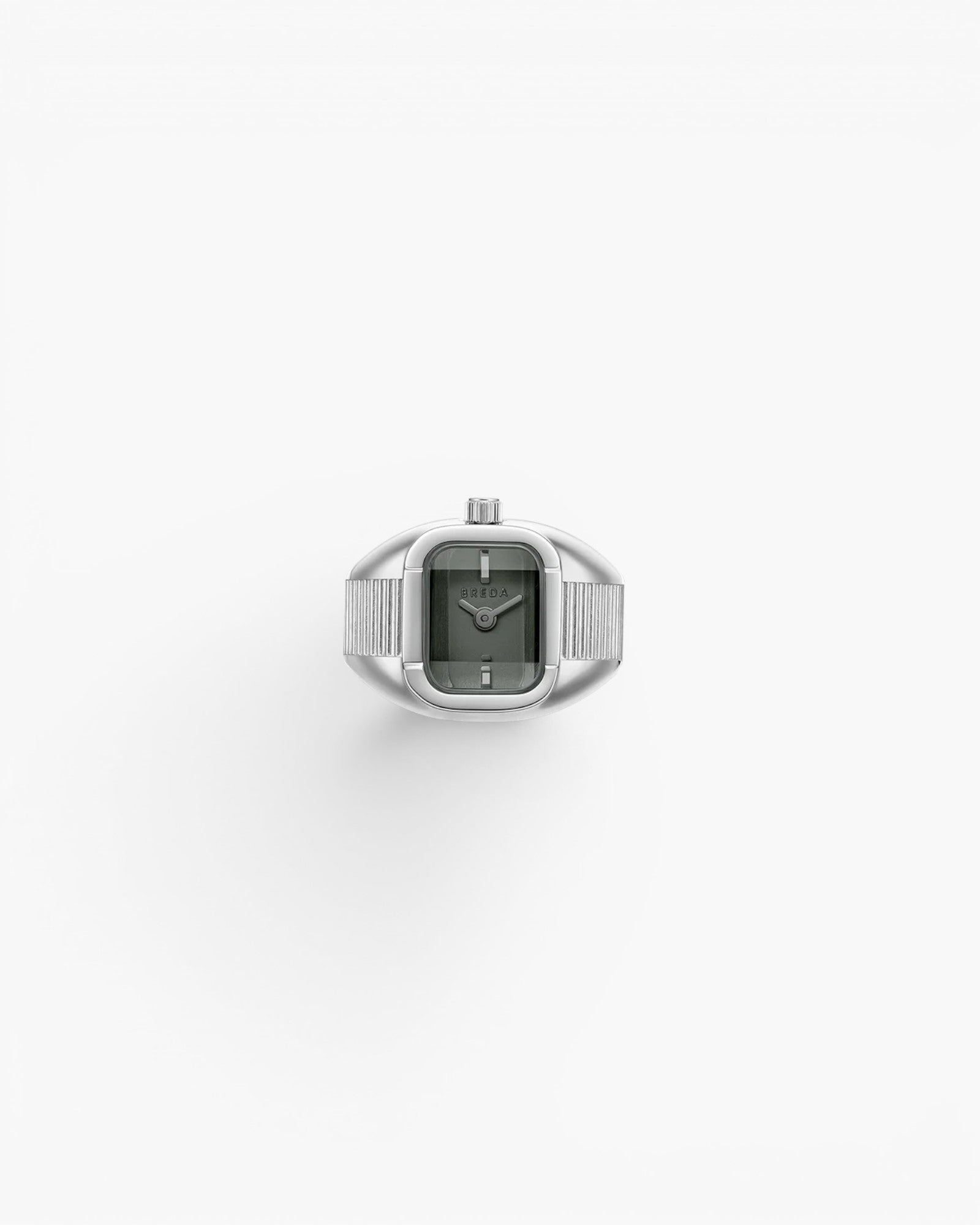 JONES + CO BREDA Nocturne Time Ring in silver stainless steel with a rectangular smoke-colored crystal watch face.