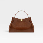 JONES + CO Gyoza pouch in brown Sierra embossed leather with a gold clasp and structured handle
