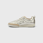 JONES + CO Bubble Ollo sneaker in metallic champagne lambskin leather with a suede toe and translucent foam sole.