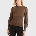 JONES + CO Loa ribbed lurex turtleneck top in caramello brown with long amphora sleeves worn by a model