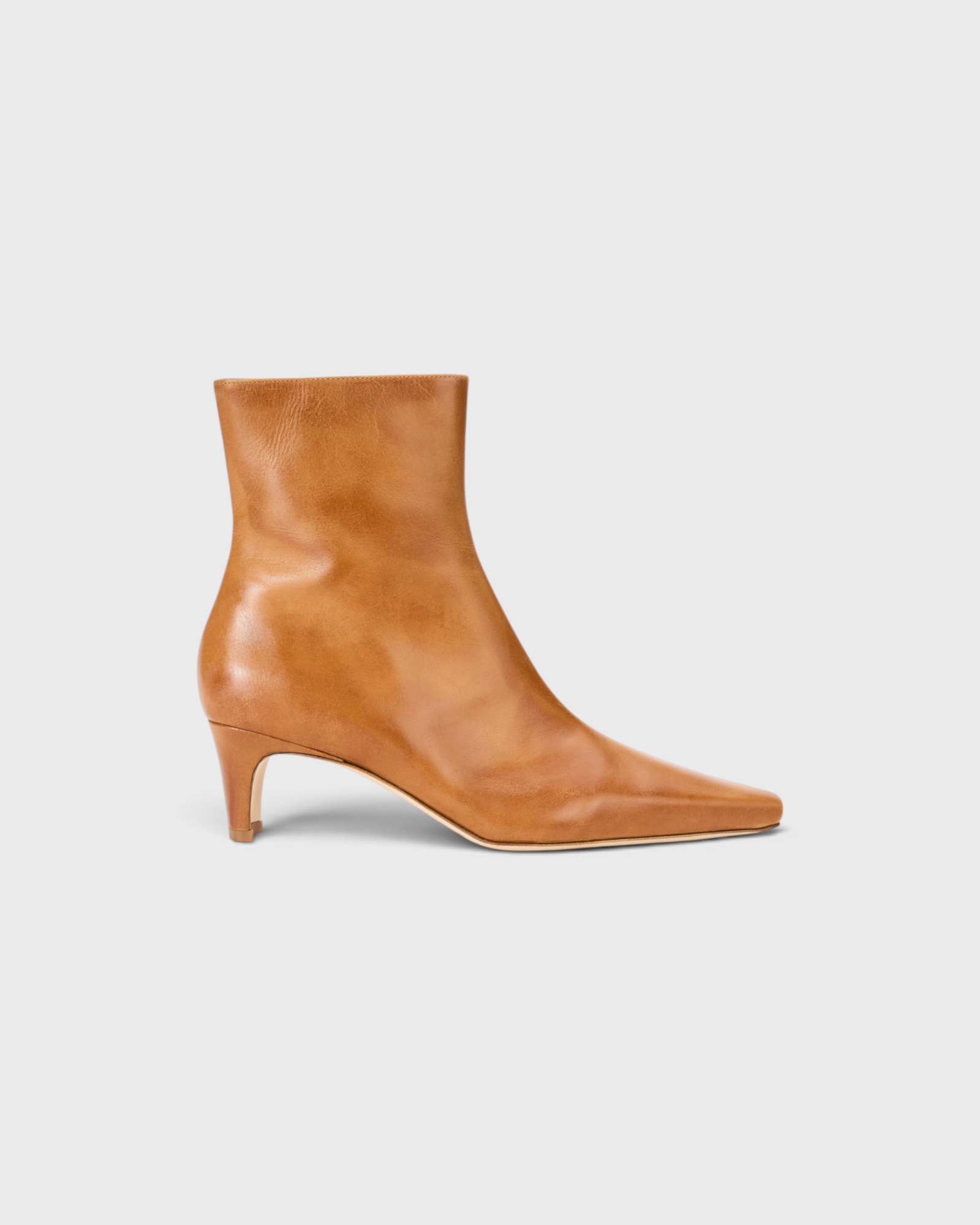 JONES + CO Wally ankle boot in cashew distressed leather with a pointed rectangular toe and slim blade heel.
